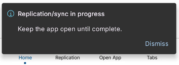 An HCL Nomad in-app notification banner displaying an information icon and the text "Replication/sync in progress. Keep the app open until complete." with a "DISMISS" button.